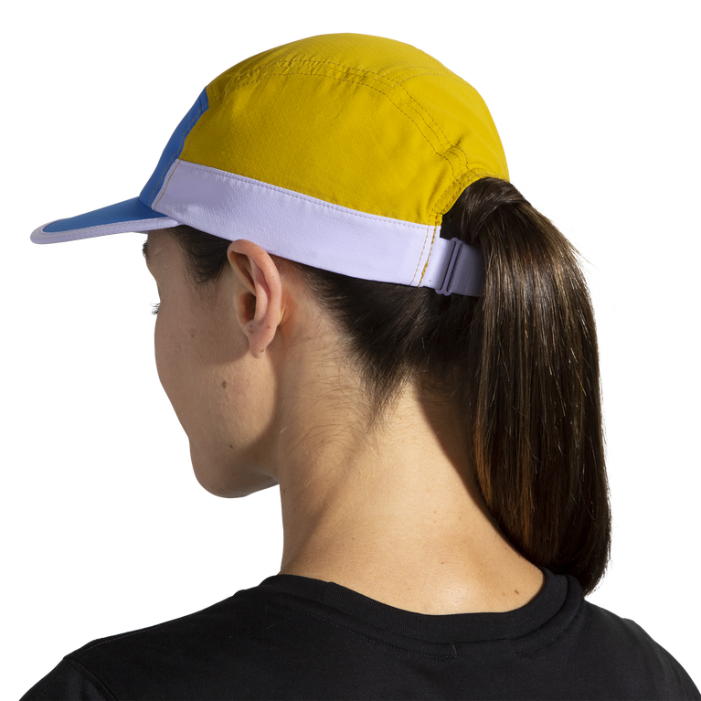 פלגים דוחפים כובע כחול-זהב שעה